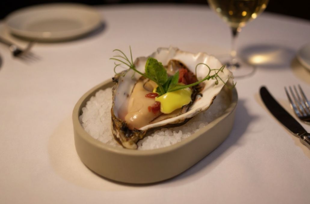 Oesters met bieslook en framboos vinaigrette